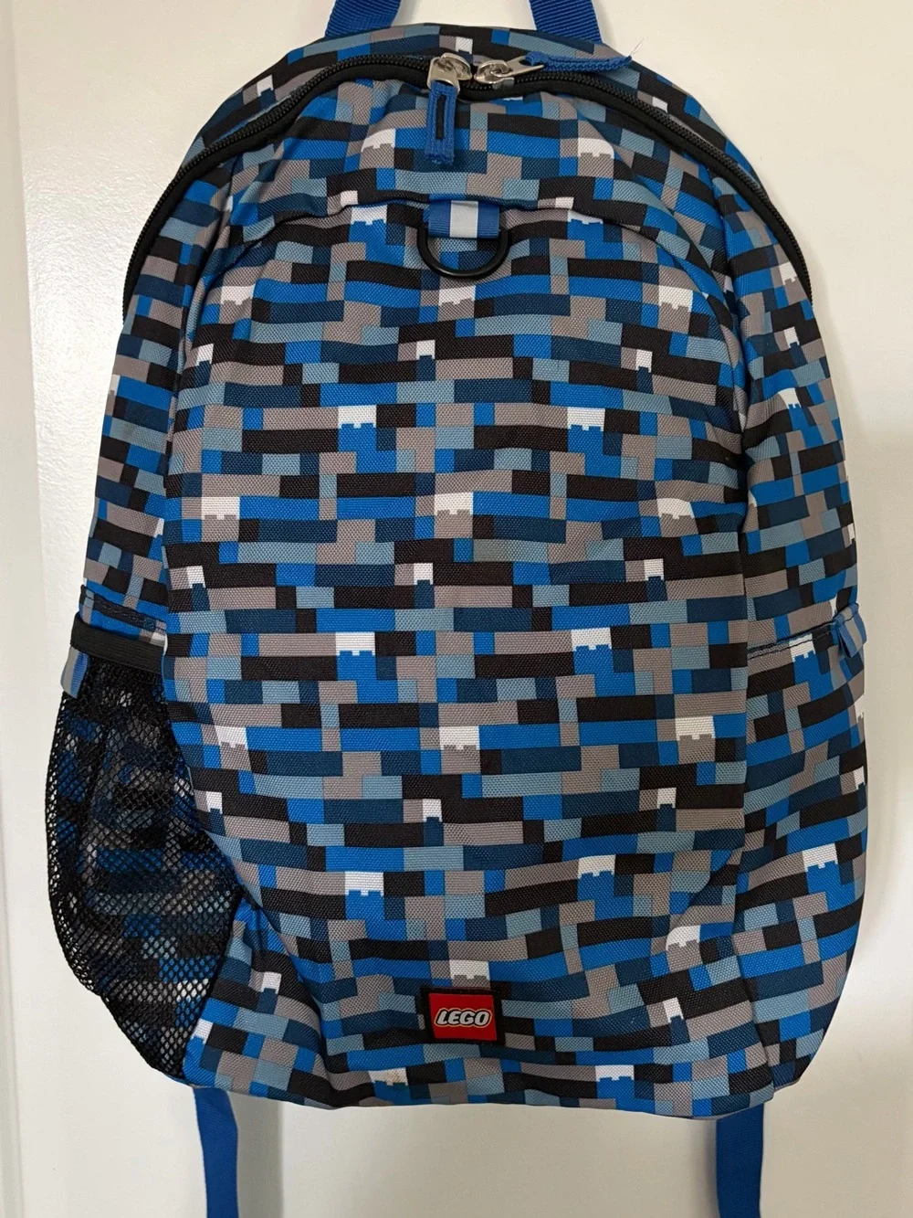 Lego Unisex Backpack in Blue, Black & Gray Pixel Print. Very Good Condition